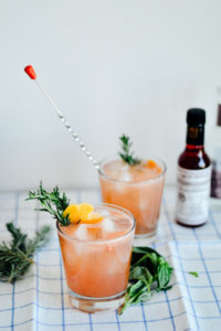 Make your own grapefruit bourbon cocktail with fresh basil syrup in 15 minutes! // by gabriella