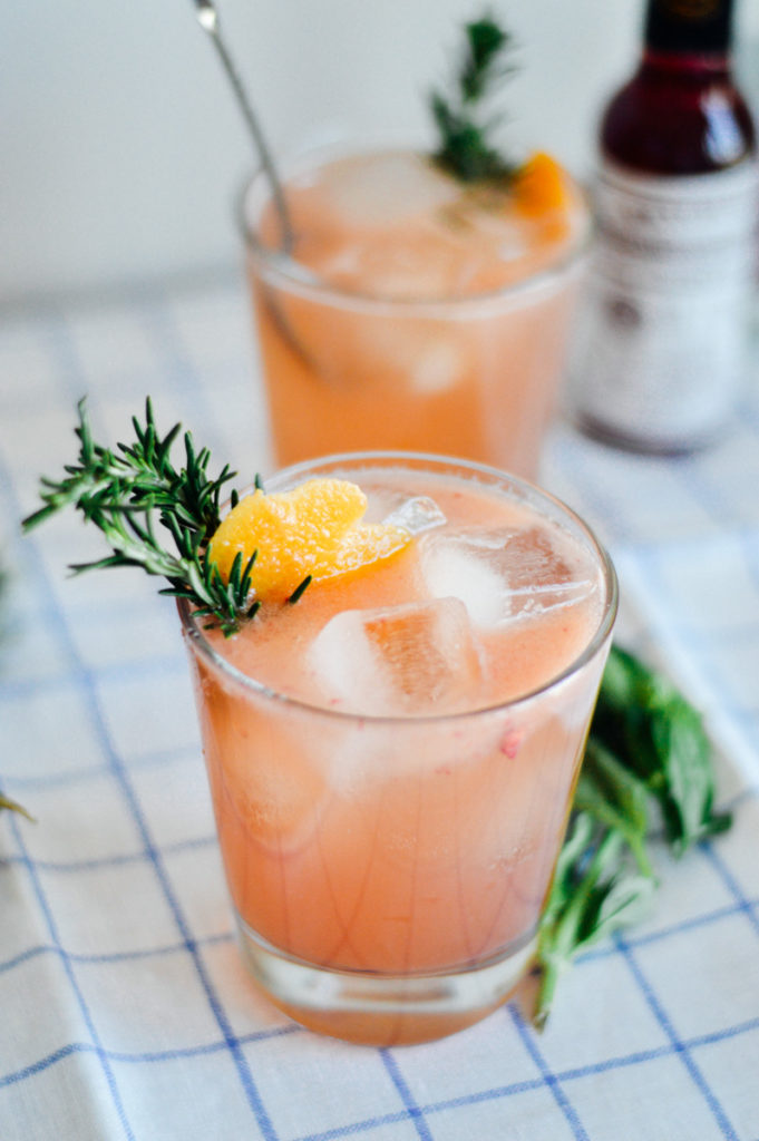 A delectable and refreshing bourbon cocktail with grapefruit and fresh basil syrup // by gabriella