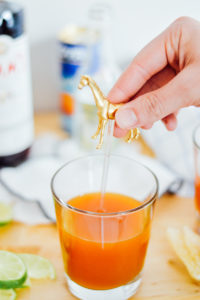A golden stirrer is the best kind of stirrer for the Apricot Pimm's Fizz / bygabriella.co