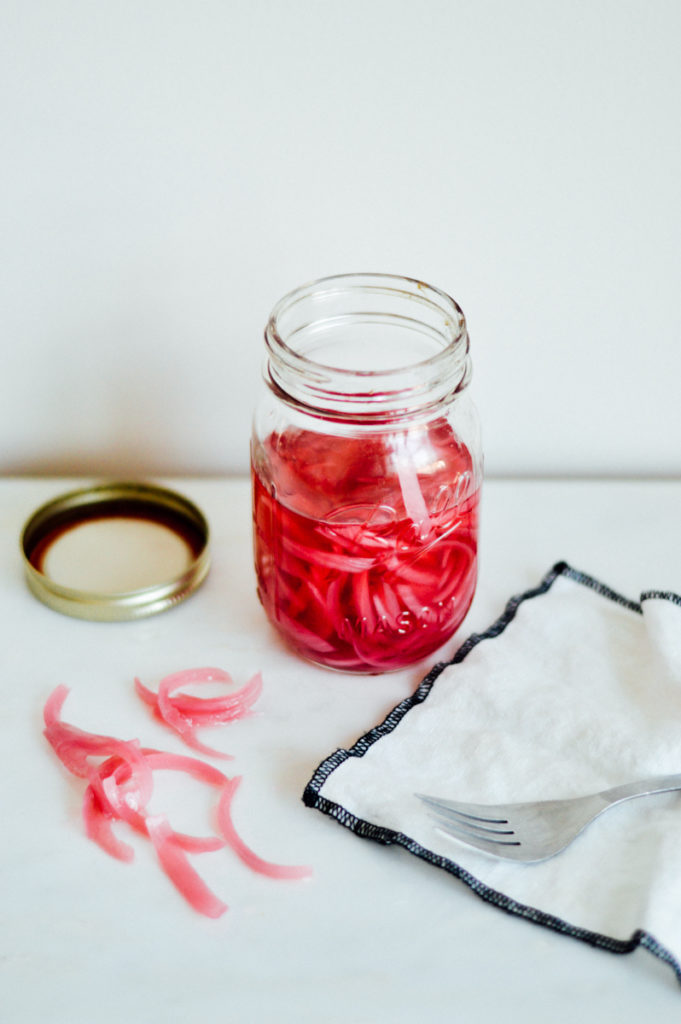 Easy pickled red onion recipe for your next taco night / bygabriella.co