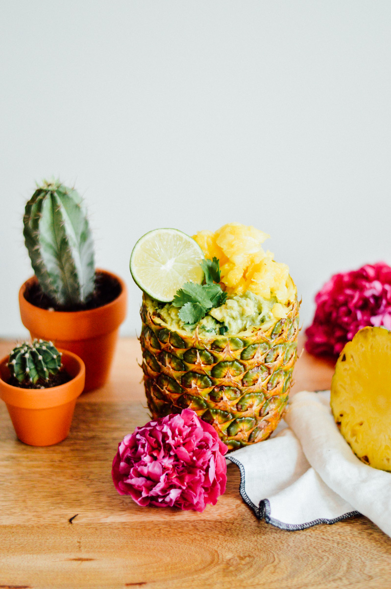 Tropical pineapple guacamole in a homemade pineapple bowl for Cinco de Mayo! / bygabriella.co