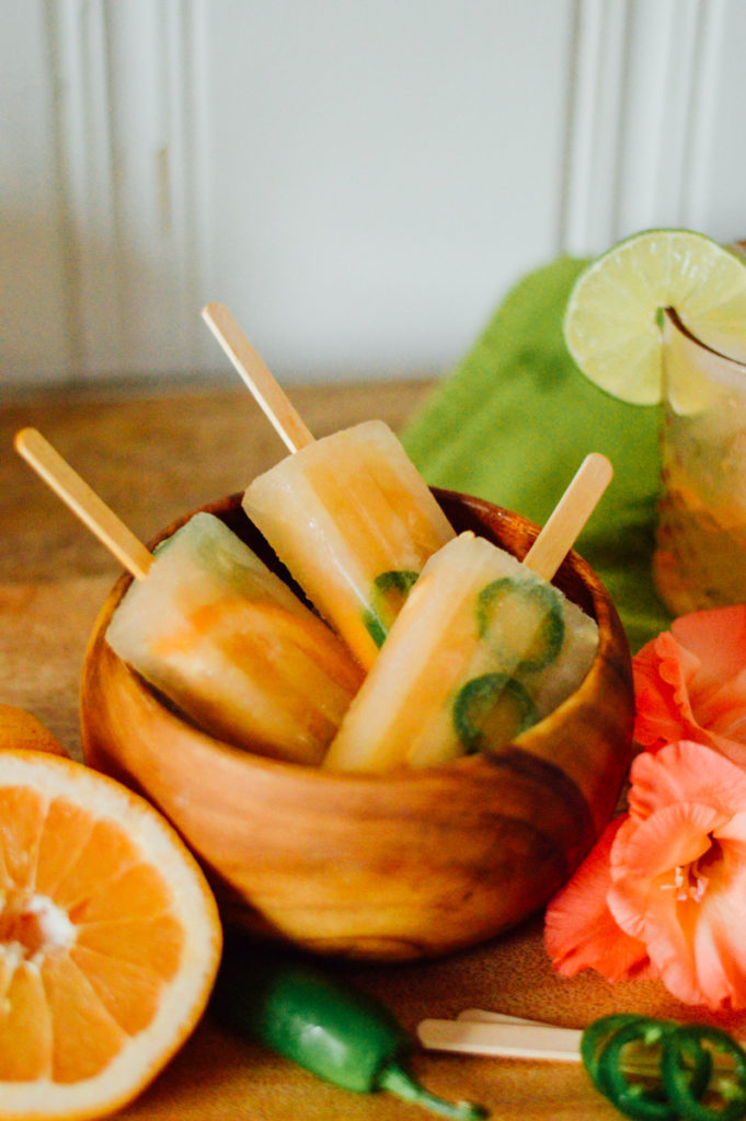 A tasty, spicy and sweet, Jalapeño Grapefruit Popsicle that you can make at home with just a handful of ingredients for your summer popsicle party. Enjoy! / bygabriella.co @gabivalladares