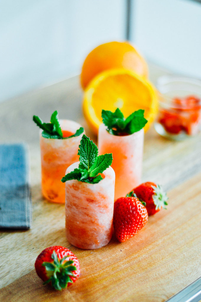 A strawberry filled, mint mezcal shot. Try making these for a mini brunch party! | bygabriella.co