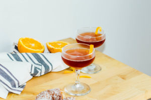 The Jack Rose Cocktail recipe - perfect for serving in a coupe glass during happy hour! | bygabriella.co