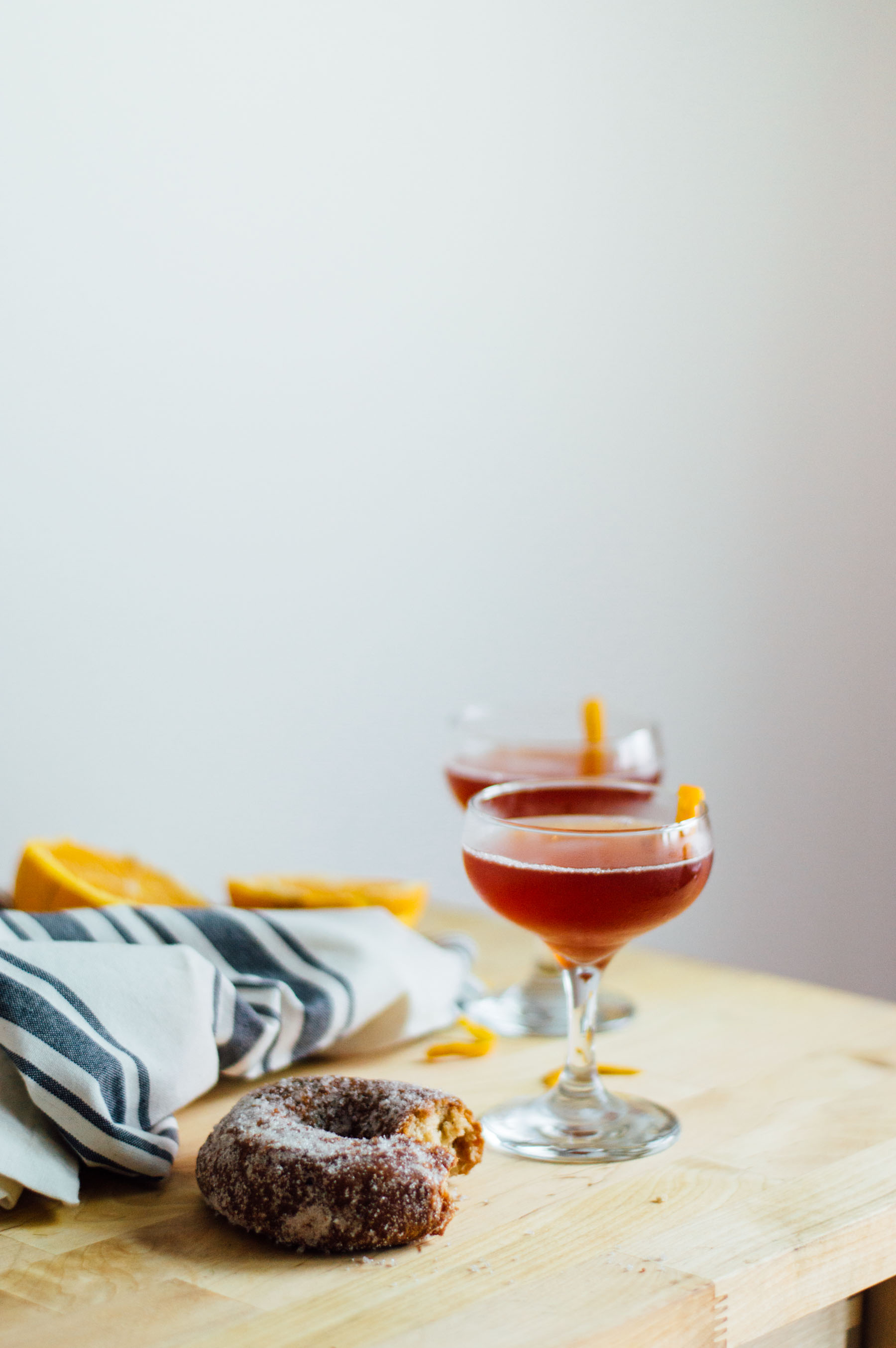 The Jack Rose Cocktail recipe - perfect for serving in a coupe glass during happy hour! | bygabriella.co