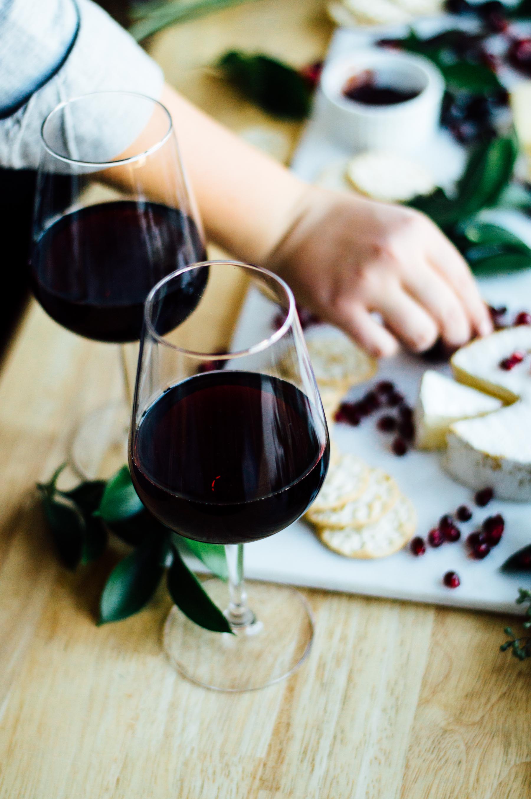 Holiday party prep tip: Select one wine to feature, then offer spiced garnishes for a make-your-own winter sangria bar! | bygabriella.co