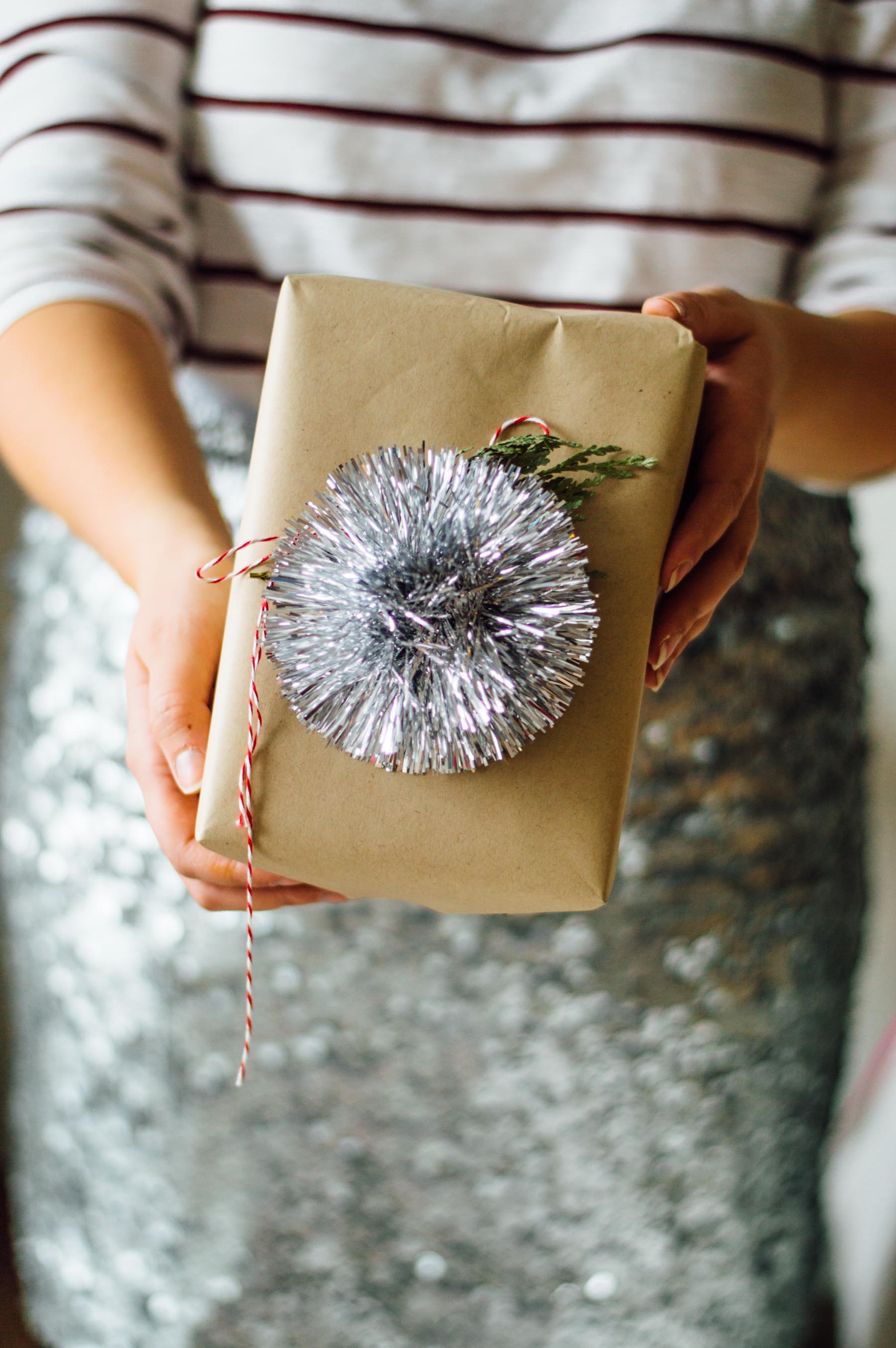 Wrap your holiday gifts this year with fresh greenery and surprises! Click through for the full article with holiday gift wrapping tips & tricks. | bygabriella.co