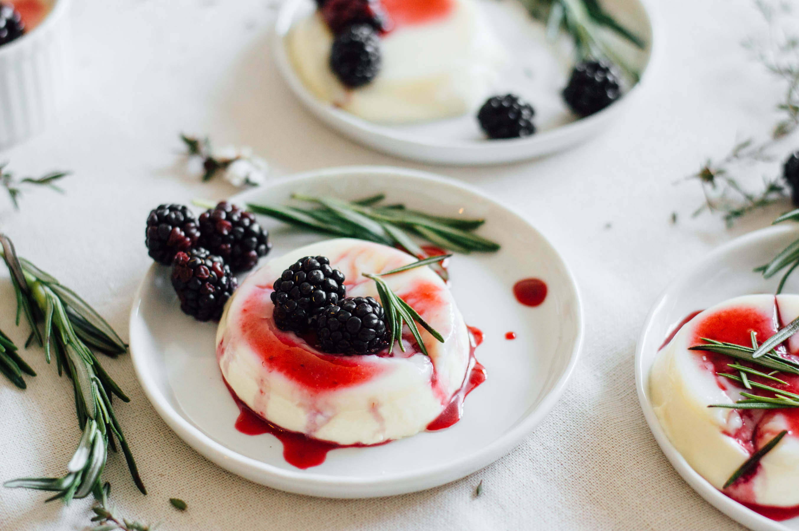 Easy dessert recipe for your next event - a Lavender Panna Cotta recipe with a Blackberry, Rosemary, & Gin Syrup | bygabriella.co