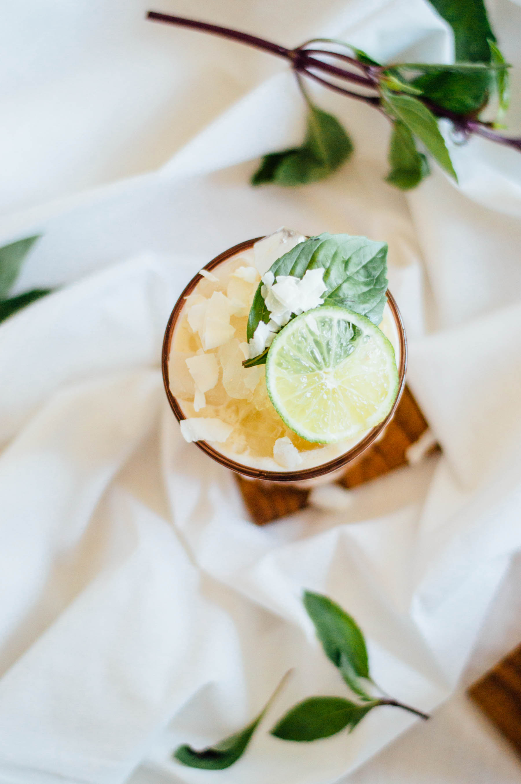 Positively delicious Tropical Rum Coco-Lada cocktail recipe with coconut flavor and a hint of pineapple. SO perfect for any season! | bygabriella.co