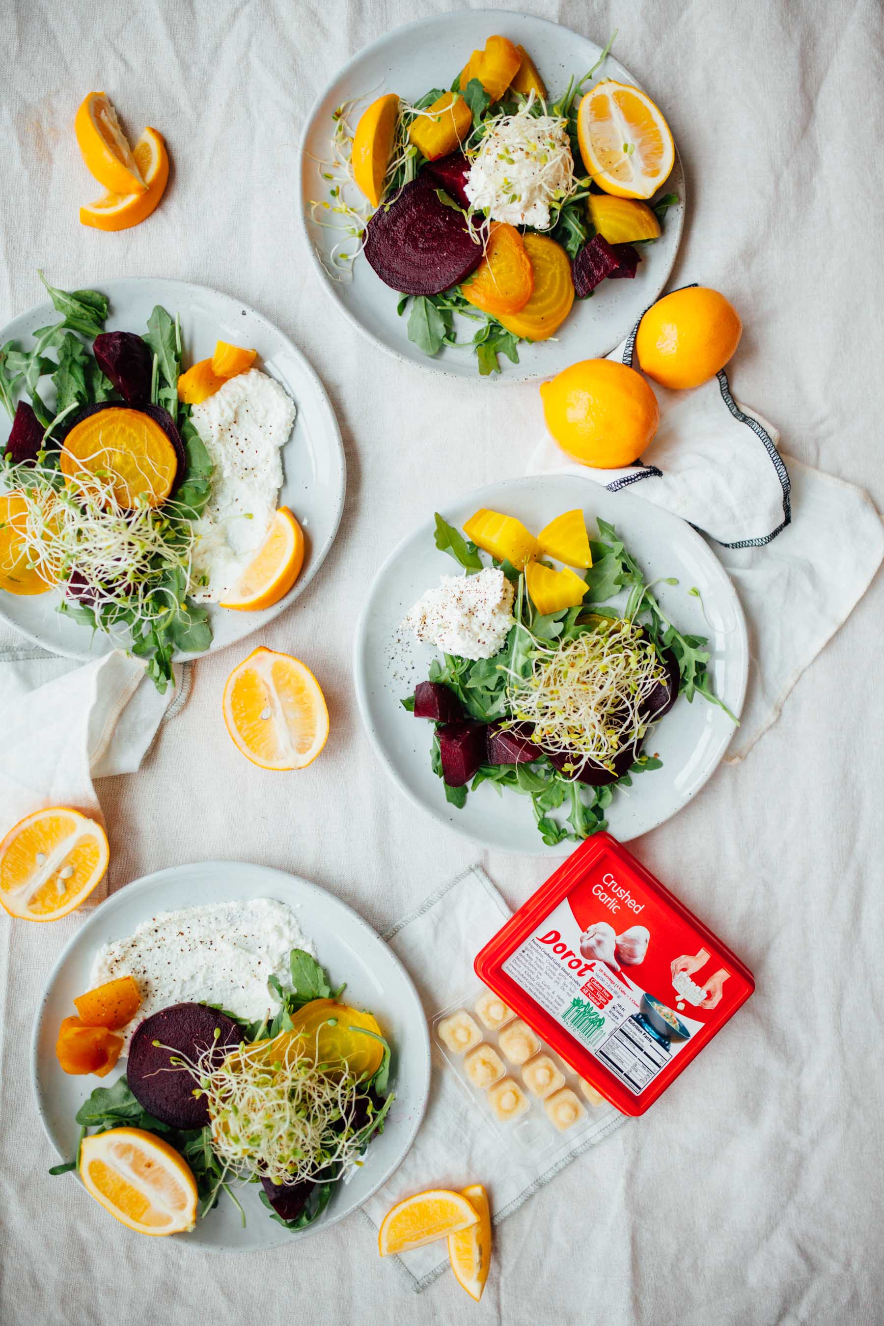Super easy Meyer Lemon Spring Salad recipe with Dorot frozen garlic, arugula, sprouts, and golden beets | bygabriella.co #sponsored