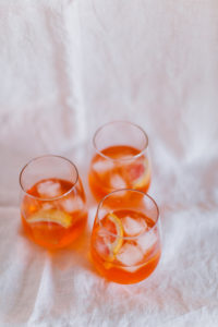 A Grapefruit Aperol Spritz made with Perrier's tasty carbonated water | bygabriella.co