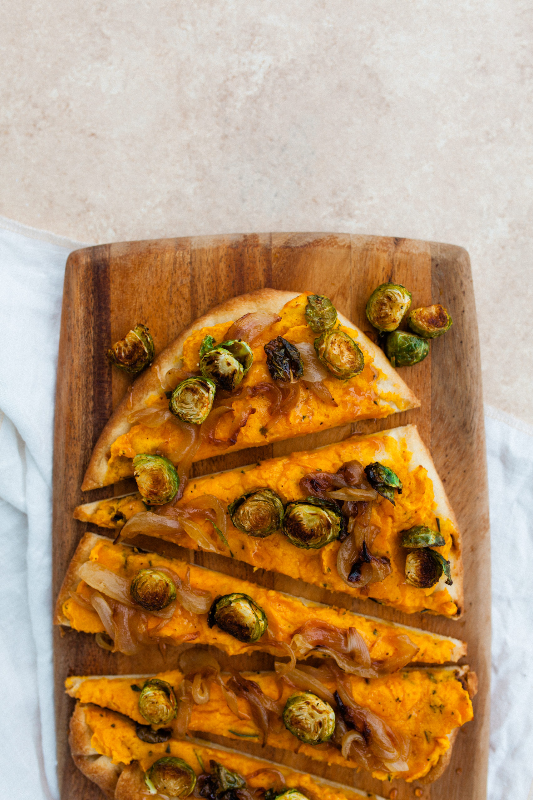 Fall Naan Pizza with Roasted Butternut Squash and Brussels Sprouts | bygabriella.co @gabivalladares
