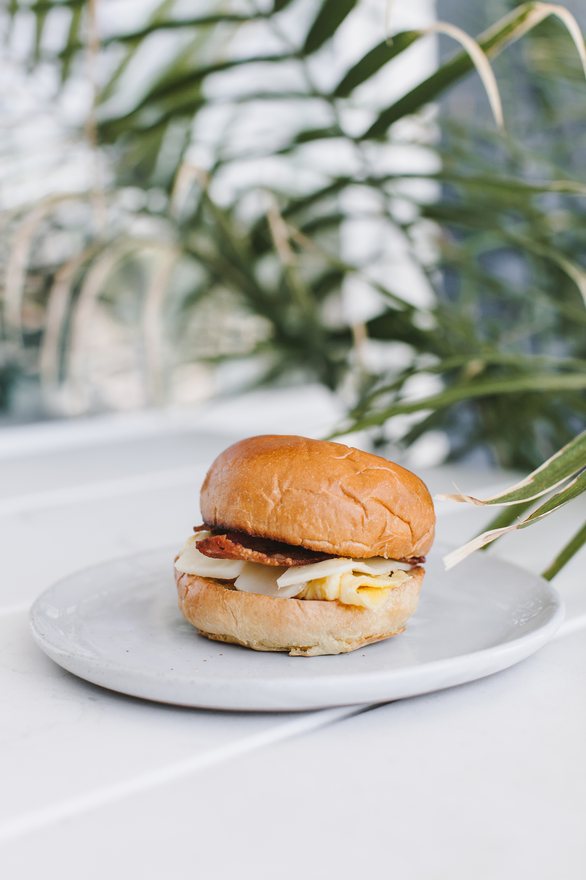 The best breakfast sandwich with rosemary maple butter, sharp vermont cheddar cheese, bacon, and eggs | bygabriella.co