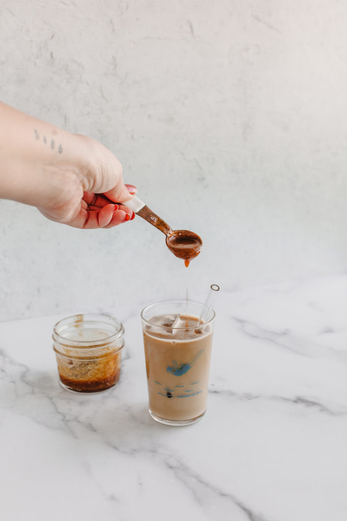 Spiced Pumpkin Caramel Sauce with ancho chile powder made right at home - here's the easy recipe to enjoy with your iced lattes, hot lattes, and more. | bygabriella.co