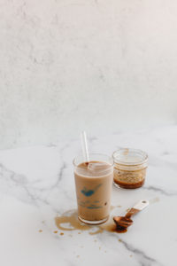 Spiced Pumpkin Caramel Sauce with ancho chile powder made right at home - here's the easy recipe to enjoy with your iced lattes, hot lattes, and more. | bygabriella.co