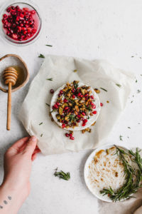 An easy baked brie recipe for the holidays featuring brown butter pistachios | bygabriella.co